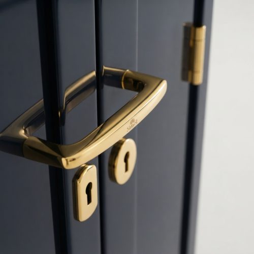 Polished_brass_handles_on_cabinet_202607301152