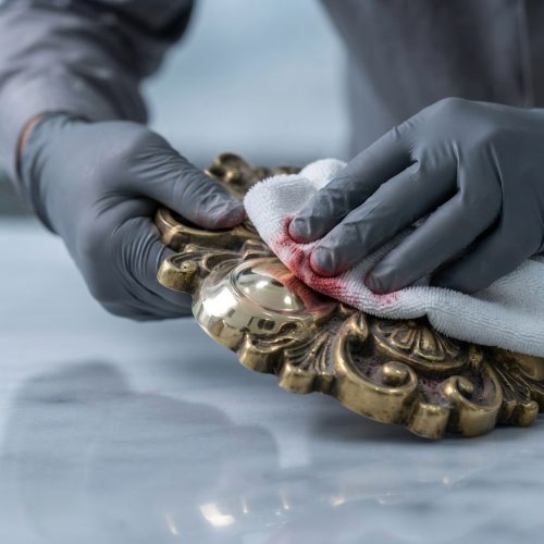 Technician_buffing_brass_ornament_202607301152